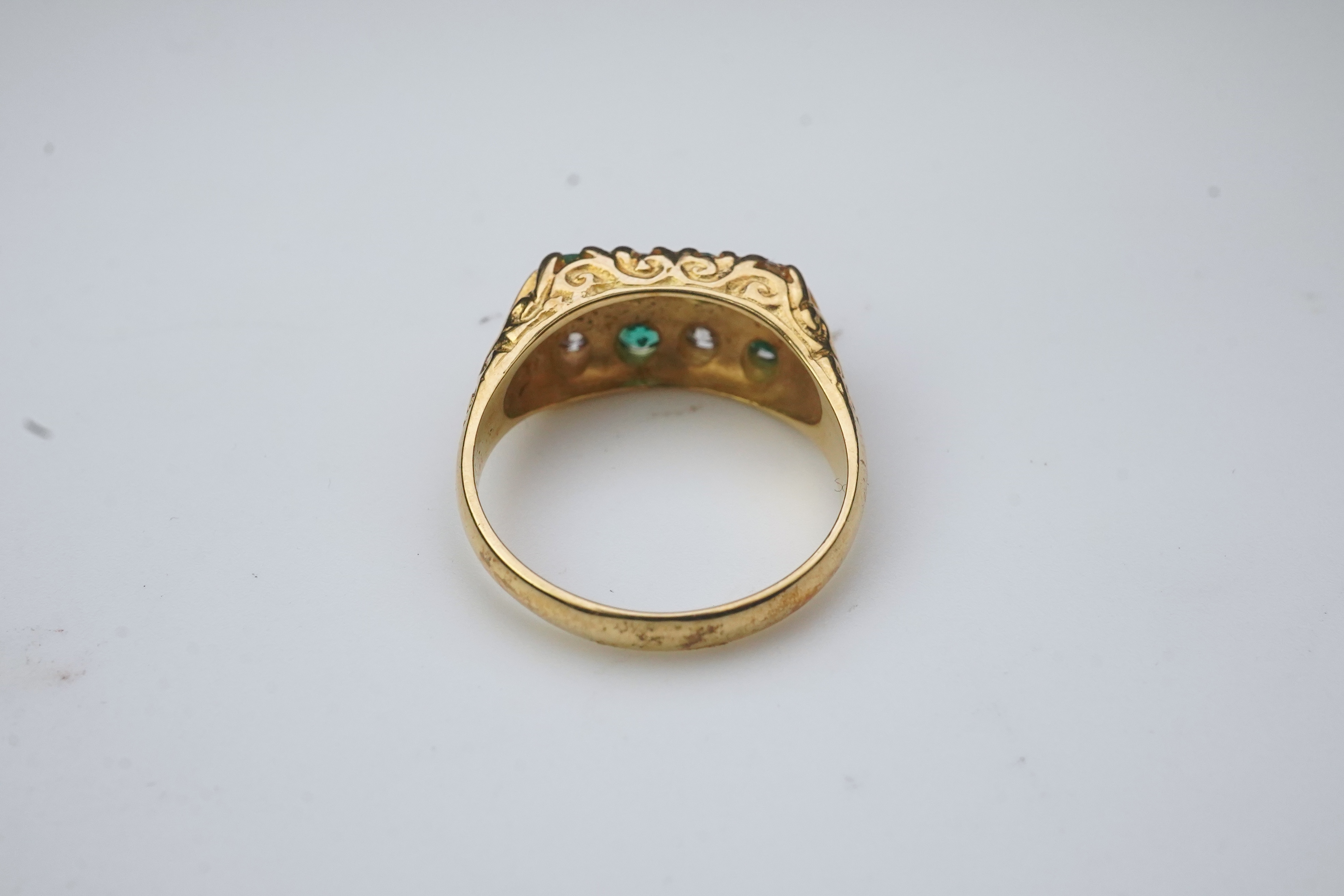 An emerald and diamond ring, circa 1975